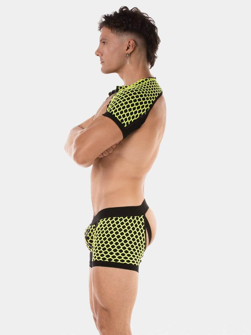 Person wearing a black and yellow mesh outfit on a white background
