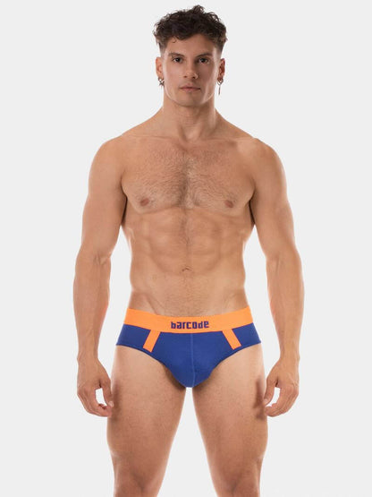 Man wearing blue and orange underwear with 'barcode' branding on a white background