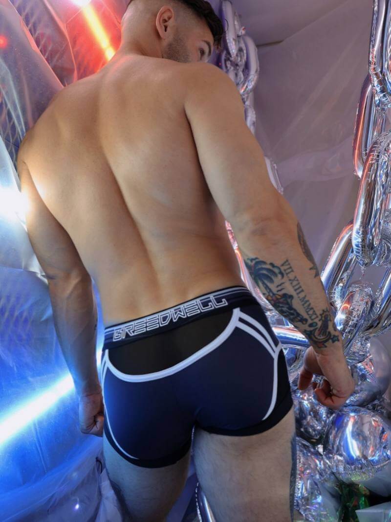 Man wearing black underwear with white trim 