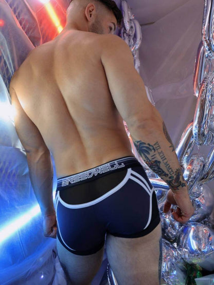 Man wearing black underwear with white trim 