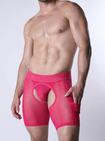 Person wearing bright pink underwear on a plain background