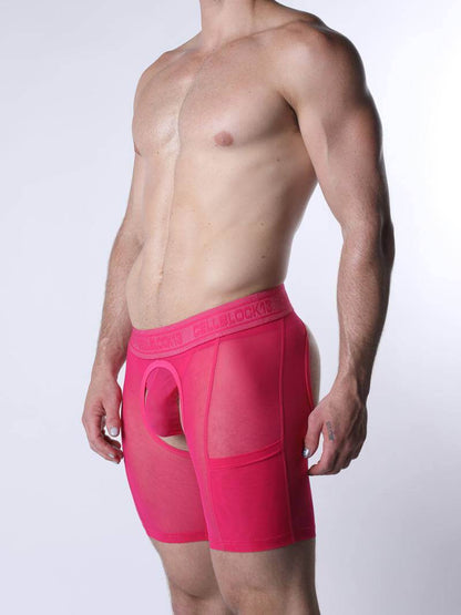 Person wearing bright pink boxer briefs on a white background