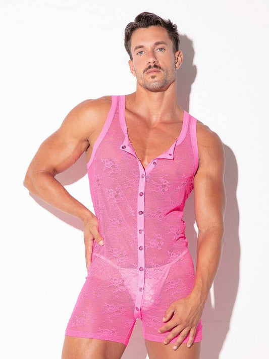 Man wearing a pink lace romper against a white background