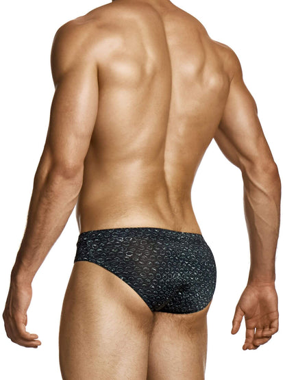 Man wearing a black patterned underwear on a white background