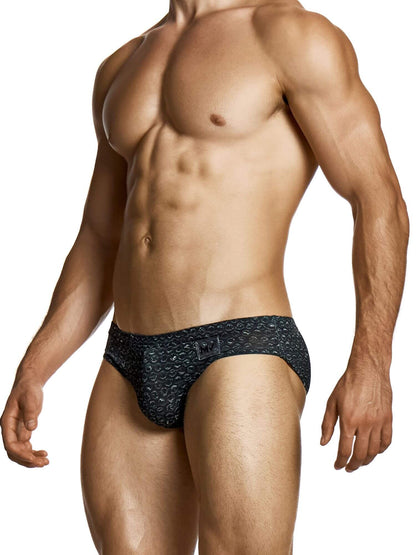 Man wearing a black bubble wrap patterned brief on a white background