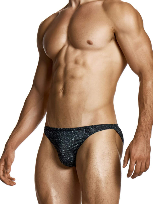 Man wearing a black patterned underwear on a white background