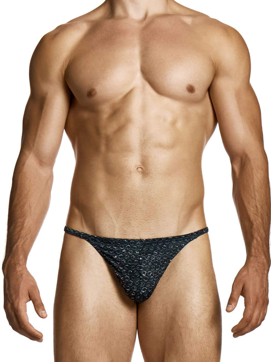 Man wearing a black patterned men's underwear on a white background