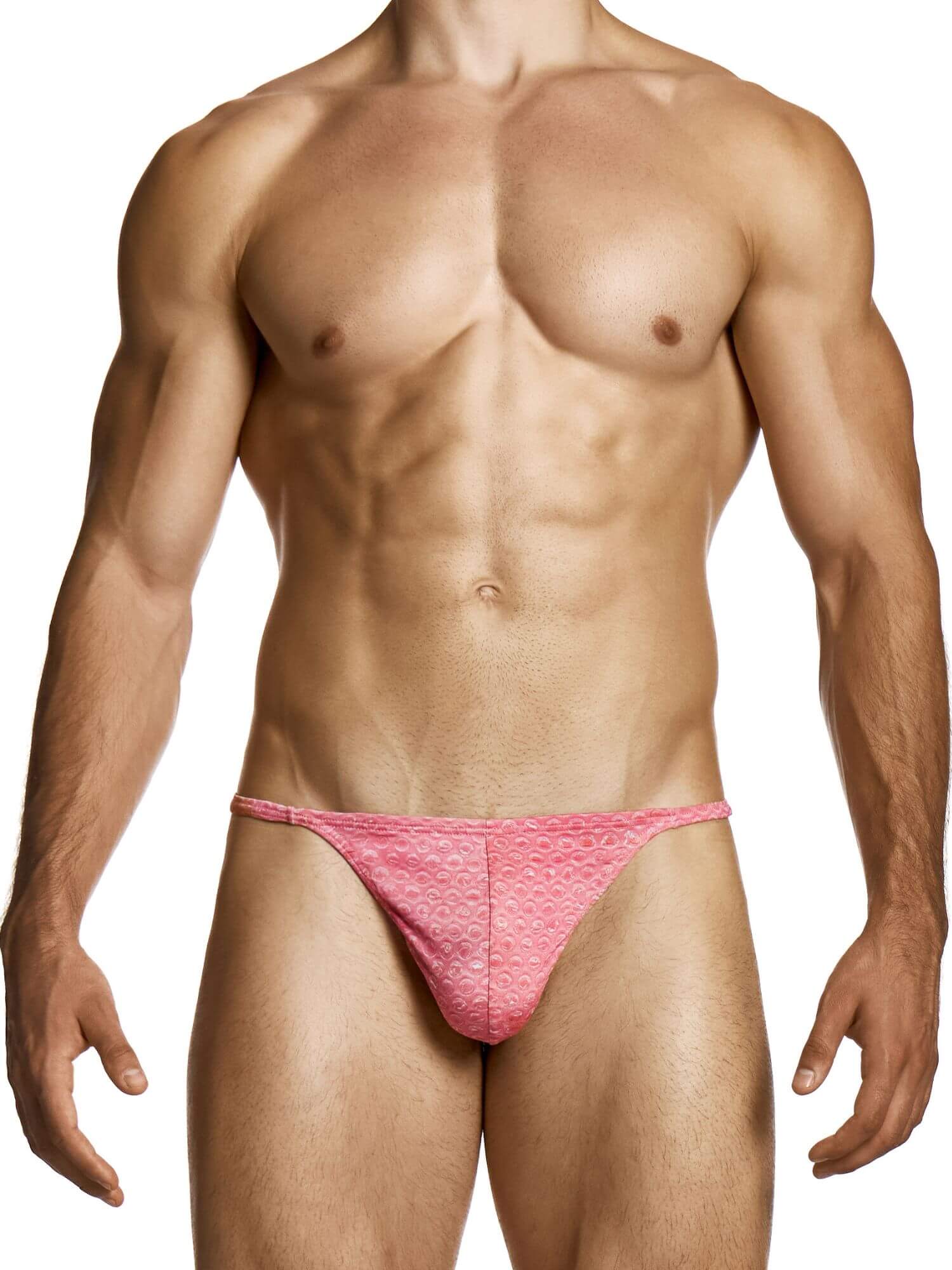 Man wearing a pink thong against a white background