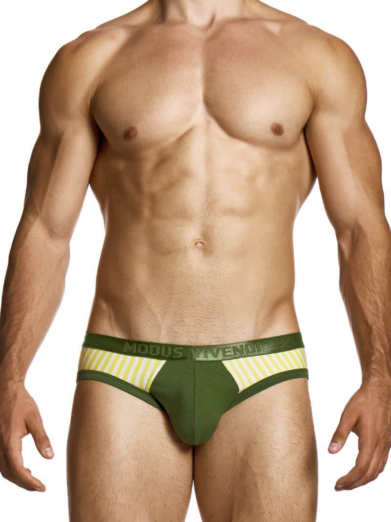 Man wearing green underwear with a visible brand logo on a white background
