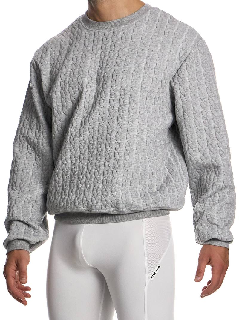 Person wearing a textured gray sweatshirt and white pants on a white background