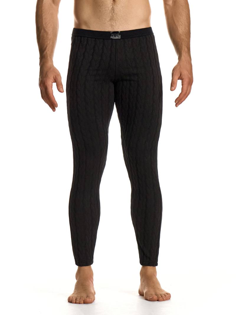 Man wearing black men's lounge pants on a white background