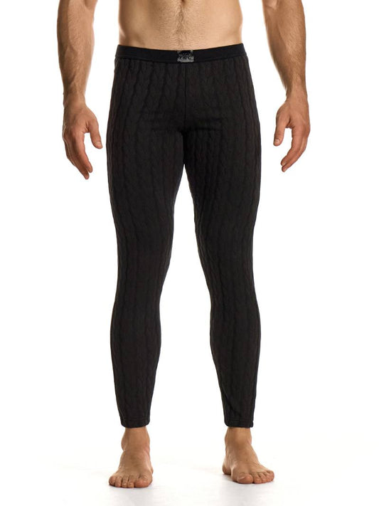 Man wearing black men's lounge pants on a white background