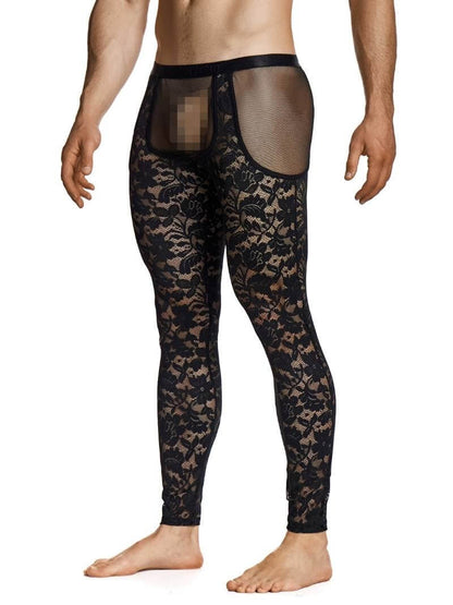 Man wearing black lace pants on a white background