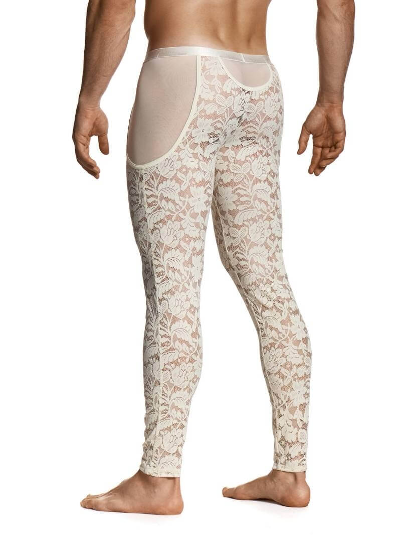 Man wearing a floral lace thong and leggings on a white background