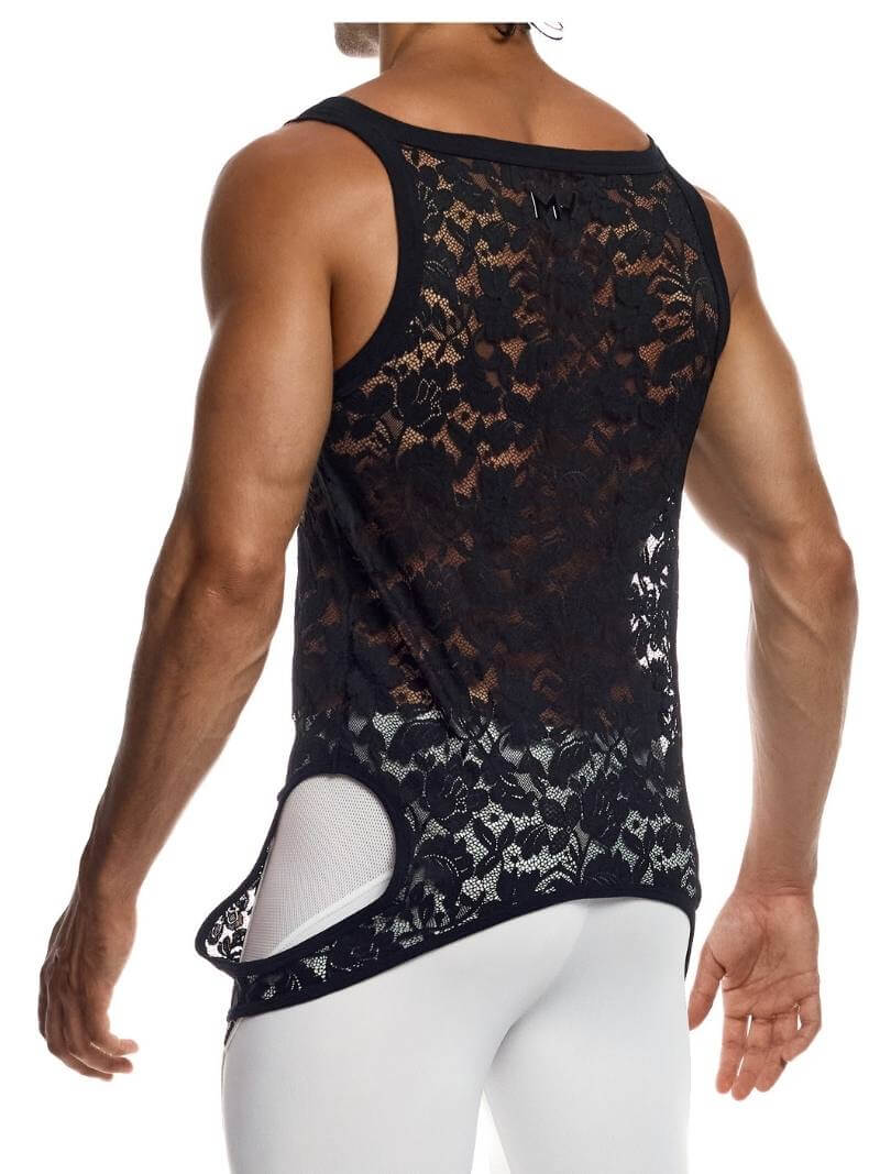 Person wearing a black lace tank top with cut-out design on a white background