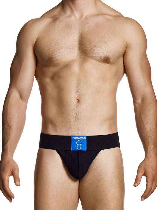 Man wearing a black men's underwear with a visible brand logo on a white background