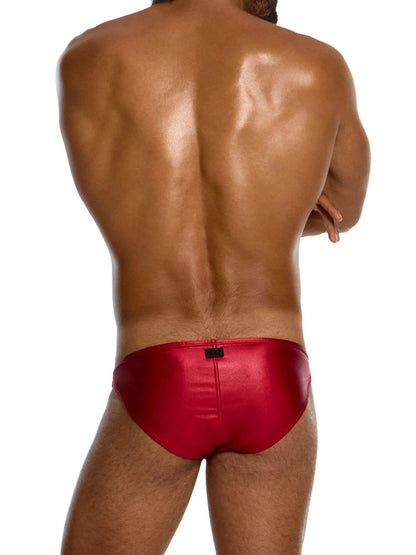 man wearing modus vivendi red prince albert swim brief against a white background
