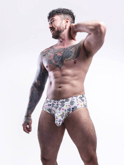 Man wearing patterned underwear against a white background