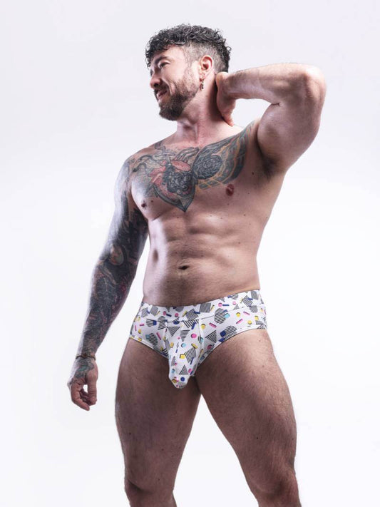 Man wearing patterned underwear against a white background