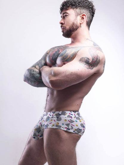 Man wearing patterned underwear against a white background