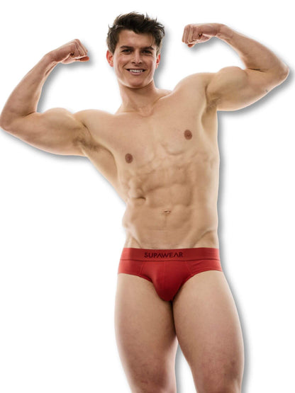 Man wearing red underwear with 'Superwear' branding on a white background